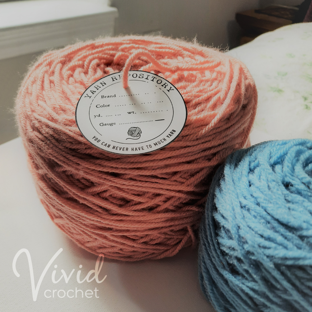 Ball of pink yarn with paper tag